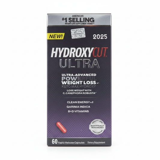 A box of HydroxyCut Ultra dietary supplement capsules on a plain white background. The packaging is dark purple and black with white and red text, featuring a yellow 'NEW!' banner and a small red-orange capsule illustration near the bottom.