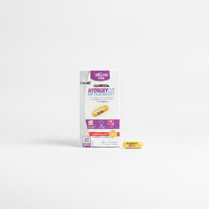 A white and purple box of NULIFE HydroxyCit Fast Face Beauty capsules stands on a white studio background, with one yellow capsule placed in front of it.